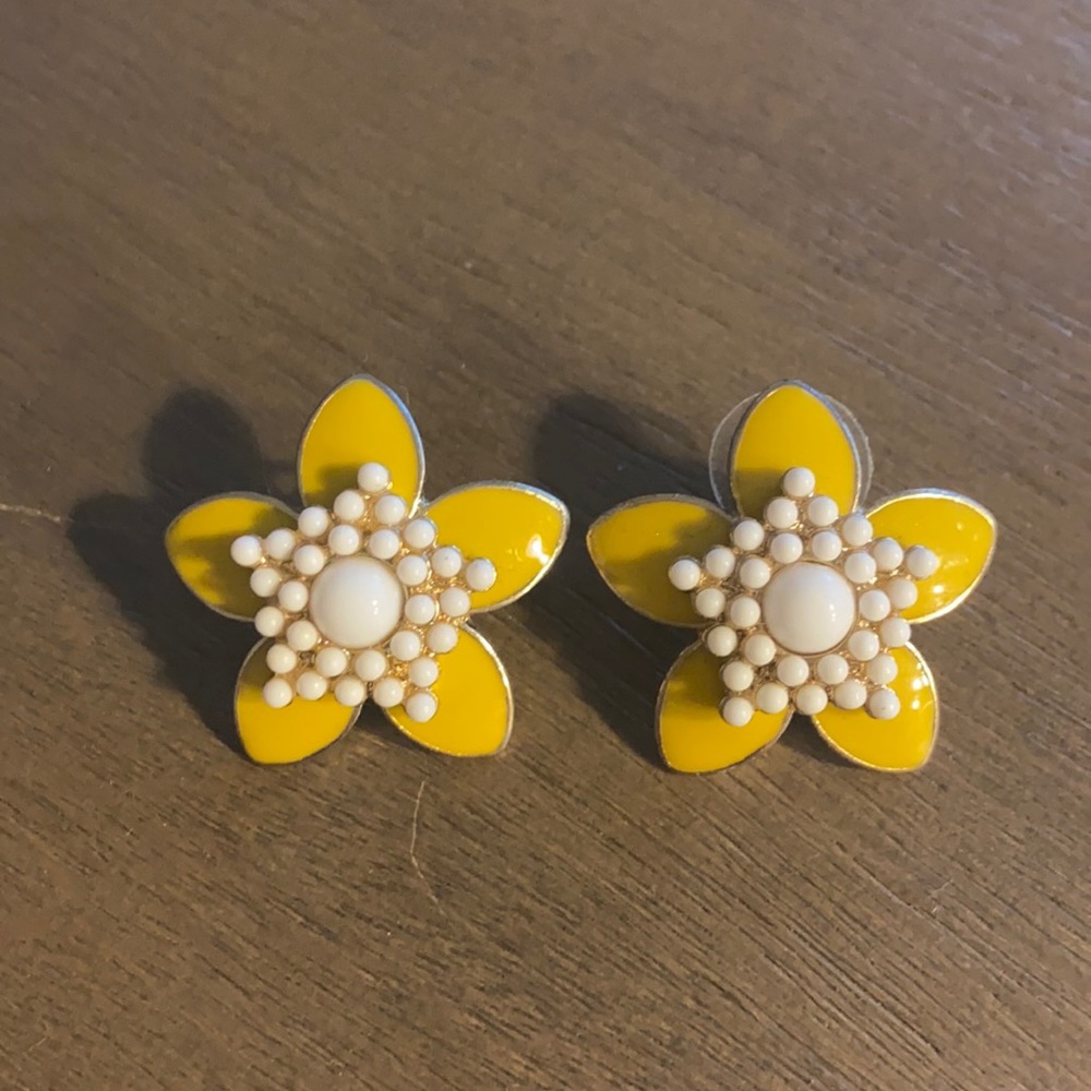 Kate Spade New York yellow flower earrings.